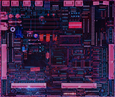 A combined view of the front and back side overlayed and aligned, with the front appearing red and the back appearing blue. Visually, it is unclear if this makes it easier or harder to trace the connections between the components.