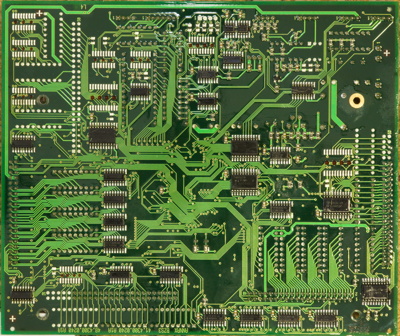 The back of the control PCB, looking slightly less messy than the front, with a few shift register ICs all over the place.